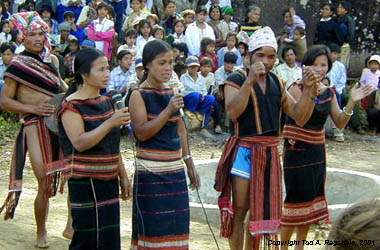 Montagnard (Jarai) audience watching 'Chong Chien' Band performance, Central Highlands, Vietnam 2000